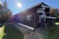 Gem�tliches Holzblockhaus-Bungalow mit besonderem Wohnambiente & idyllischem Garten (Baugrundst�ck)