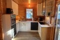 Gem�tliches Holzblockhaus-Bungalow mit besonderem Wohnambiente & idyllischem Garten (Baugrundst�ck)