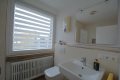 Renovierte Eigentumswohnung mit Balkon, Garage und Parkplatz