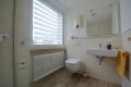 Renovierte Eigentumswohnung mit Balkon, Garage und Parkplatz